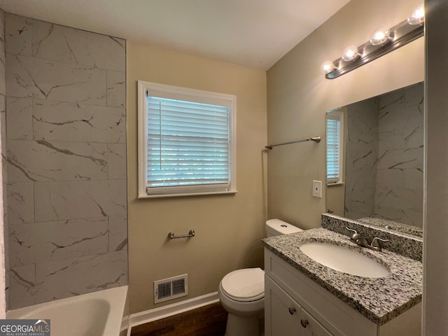 full bathroom featuring vanity, hardwood / wood-style floors, separate shower and tub, and toilet