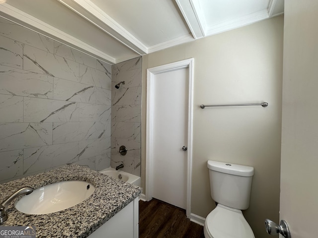 bathroom featuring shower / bathtub combination, toilet, wood finished floors, and vanity