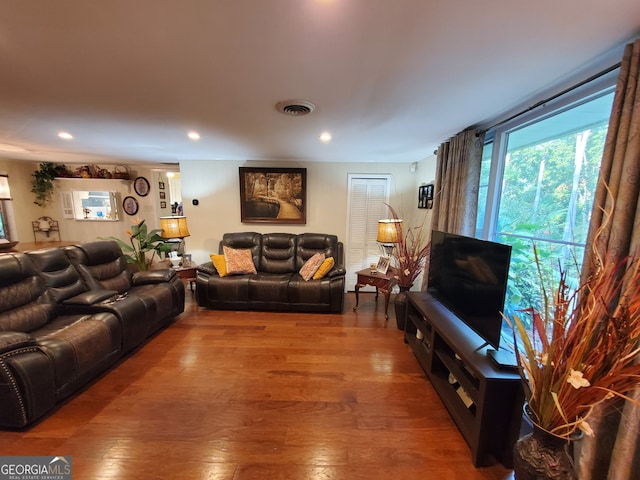 living room with hardwood / wood-style floors