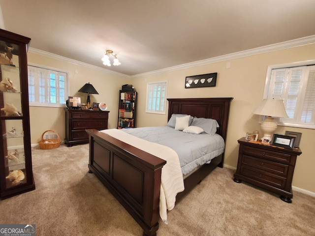 bedroom with light carpet, crown molding, and baseboards