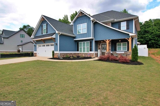 craftsman-style home with a front lawn and a garage