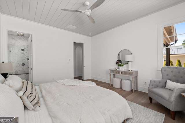 bedroom with baseboards, arched walkways, a ceiling fan, wooden ceiling, and wood finished floors