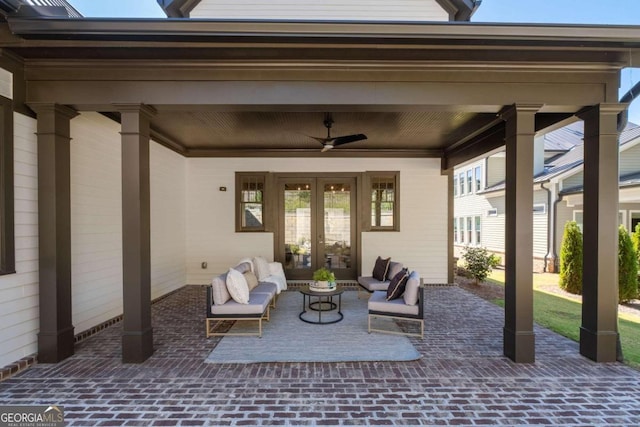 view of patio with french doors, an outdoor living space, and a ceiling fan