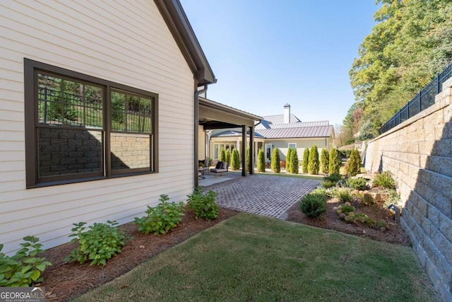 exterior space with a patio and fence