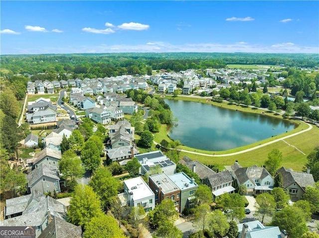 birds eye view of property featuring a residential view and a water view