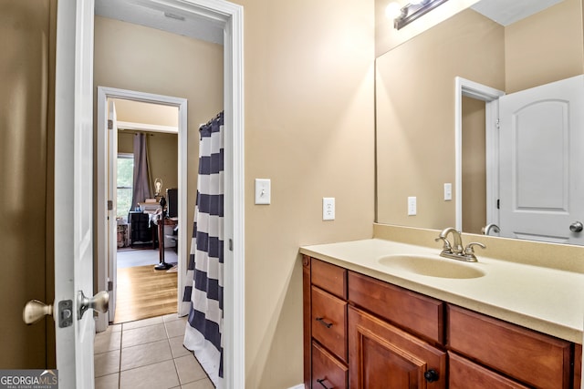 bathroom with vanity and tile patterned floors