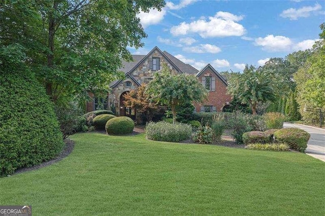 exterior space with a front yard