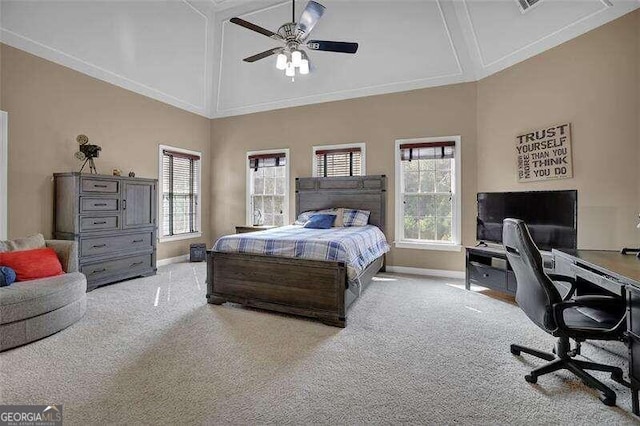 bedroom with ceiling fan, light carpet, and high vaulted ceiling