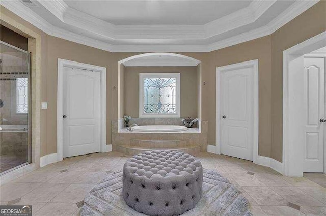 bathroom with crown molding, tile patterned floors, a tray ceiling, and shower with separate bathtub