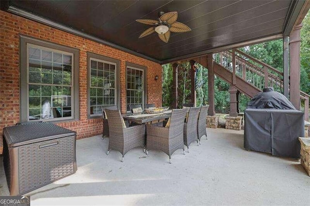 view of patio featuring ceiling fan