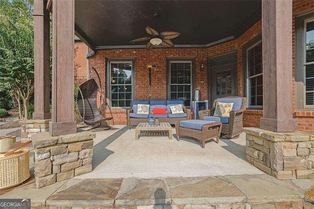 view of patio / terrace featuring ceiling fan