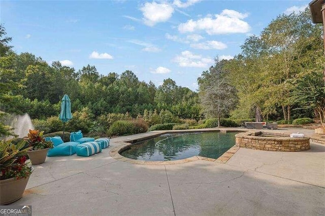 view of pool featuring a patio area