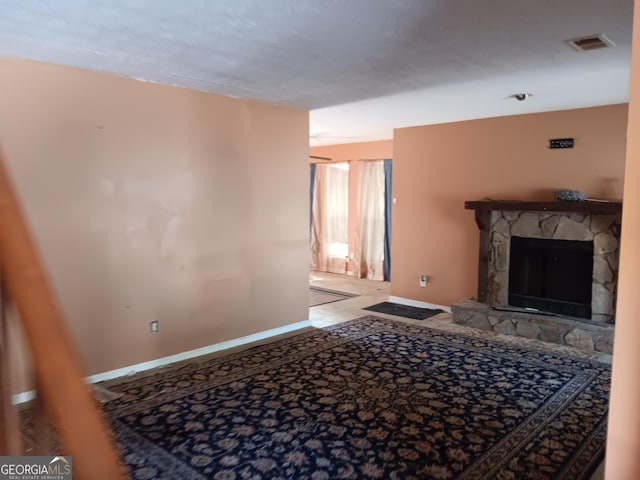 living room featuring a fireplace