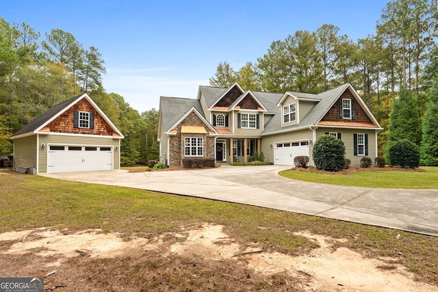 craftsman-style house with a front yard and a garage