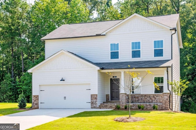 view of front of house with a front lawn and a garage