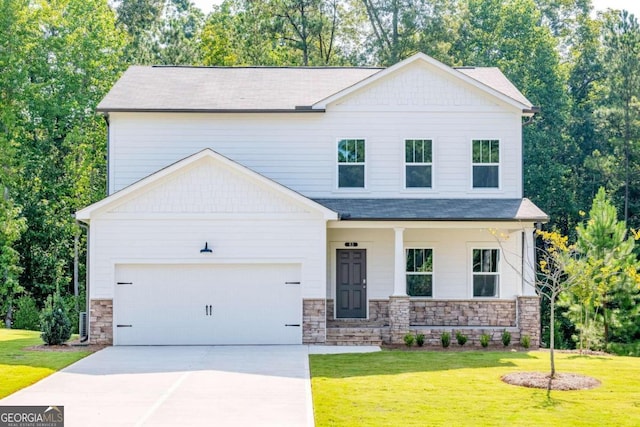 view of front facade featuring a garage and a front lawn