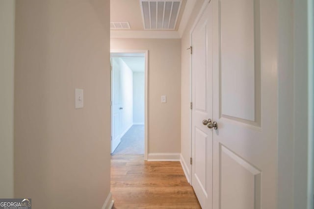 134 Henley St W Unit 09, Canton, GA 30114 - hallway featuring light wood finished floors and baseboards