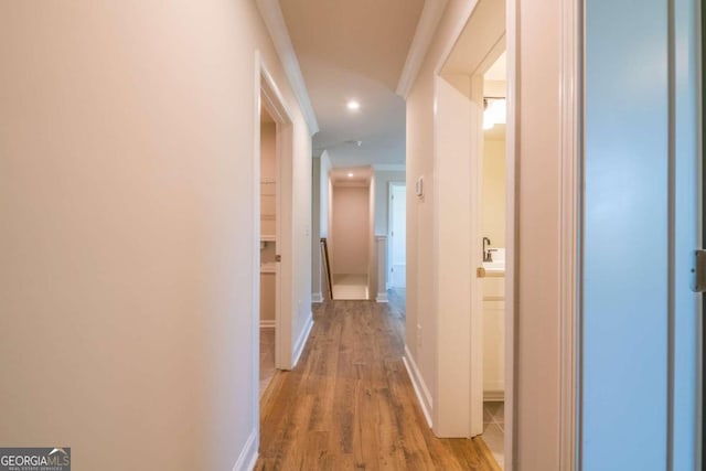 134 Henley St W Unit 09, Canton, GA 30114 - hallway featuring wood finished floors, ornamental molding, recessed lighting, and baseboards