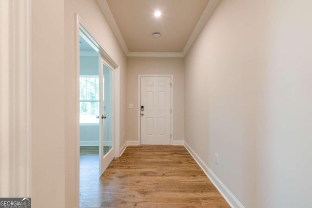 134 Henley St W Unit 09, Canton, GA 30114 - hallway featuring light wood-type flooring, crown molding, and baseboards