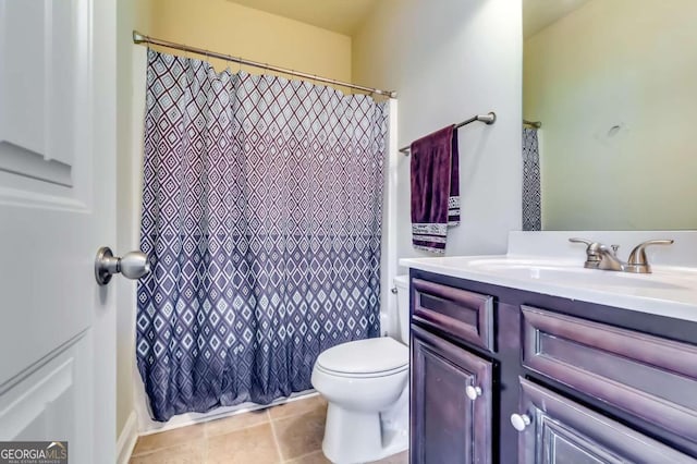 full bathroom with vanity, shower / bath combo, toilet, and tile patterned flooring