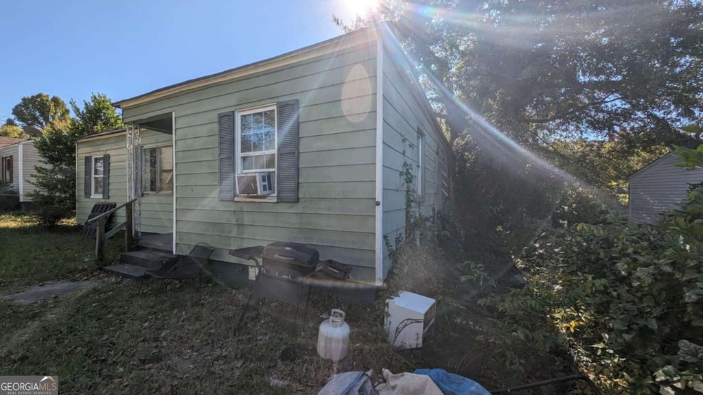 968 Quinlan Dr, Macon, GA 31206 - view of side of home featuring entry steps and cooling unit