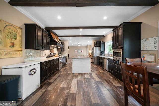 kitchen featuring appliances with stainless steel finishes, sink, dark hardwood / wood-style flooring, beamed ceiling, and premium range hood