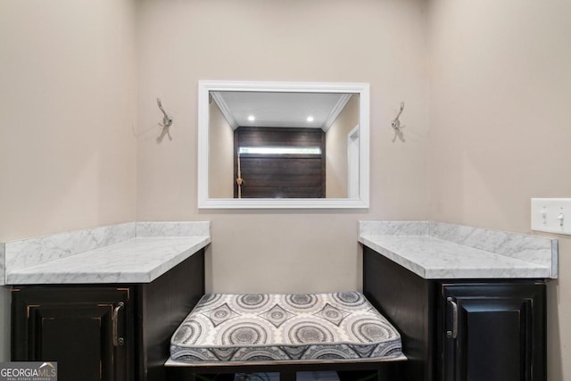 bathroom featuring crown molding