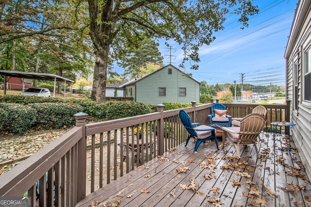 deck featuring a carport