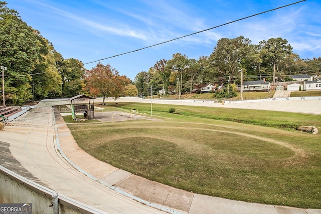 view of home's community featuring a lawn