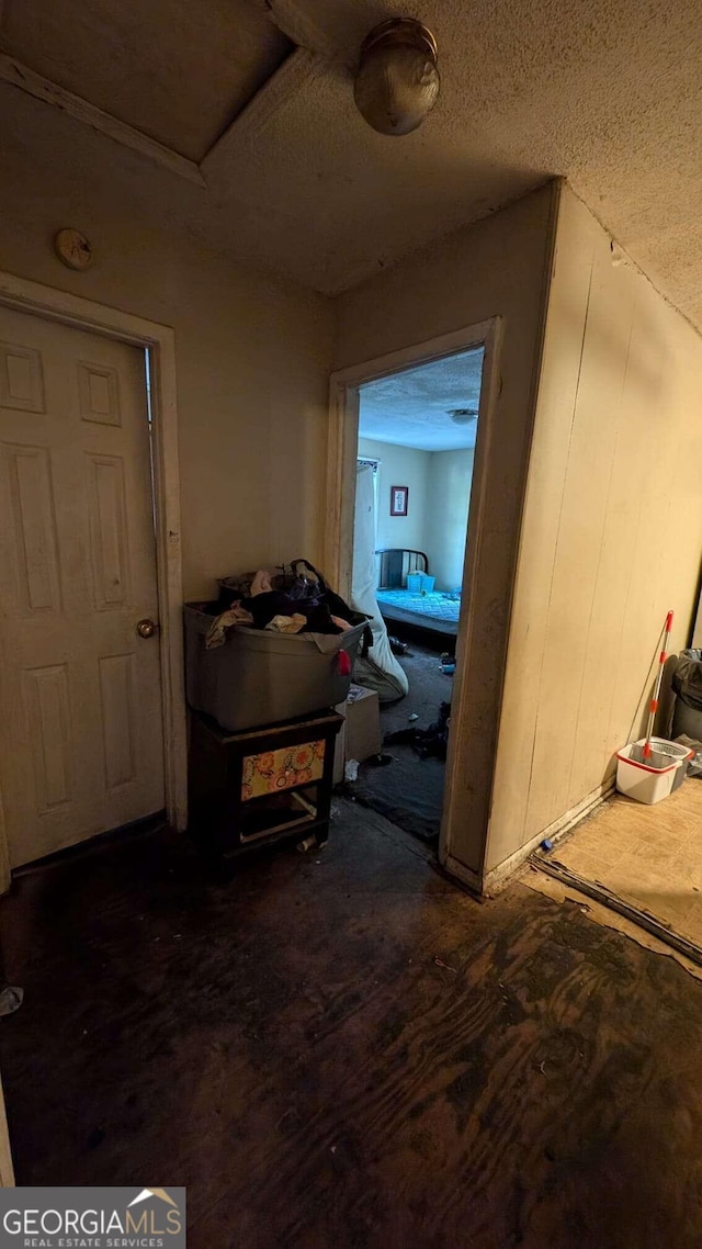 646 Straight St, Macon, GA 31204 - corridor with dark wood-type flooring and a textured ceiling