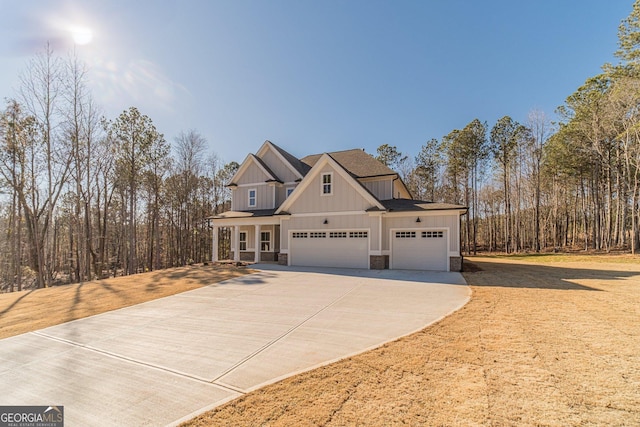 craftsman-style house featuring a garage and a porch