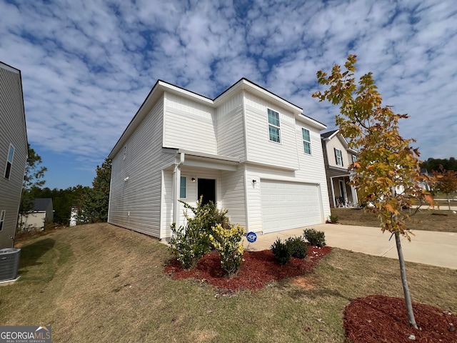 view of front of home with cooling unit and a garage