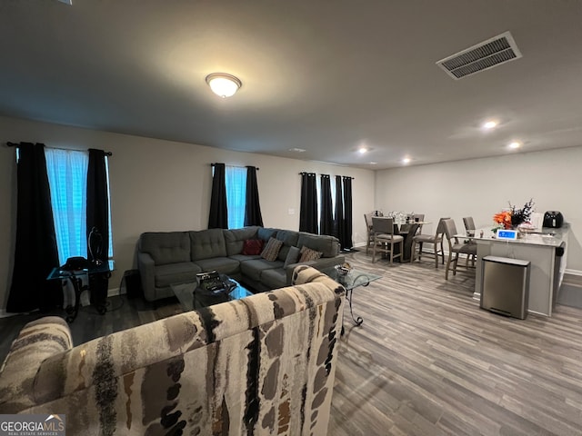 living room with hardwood / wood-style flooring