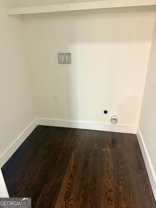 washroom featuring hookup for an electric dryer, hookup for a washing machine, and hardwood / wood-style flooring