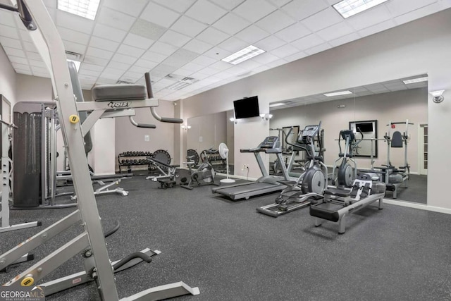 exercise room featuring a drop ceiling