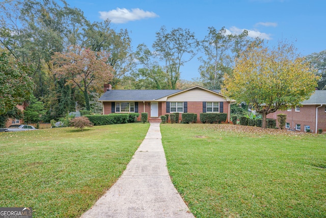 ranch-style home with a front yard