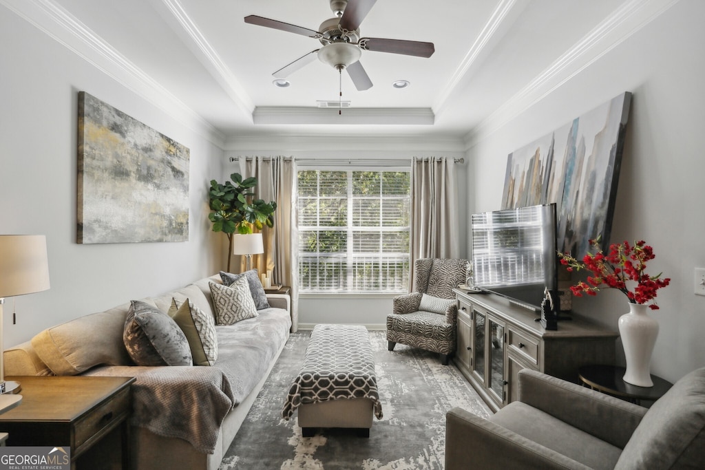 10 Perimeter Summit Blvd NE Unit 4435, Brookhaven, GA 30319 - living room featuring ceiling fan, ornamental molding, and a tray ceiling