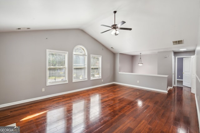 unfurnished living room featuring dark wood-type flooring, ceiling fan, and lofted ceiling