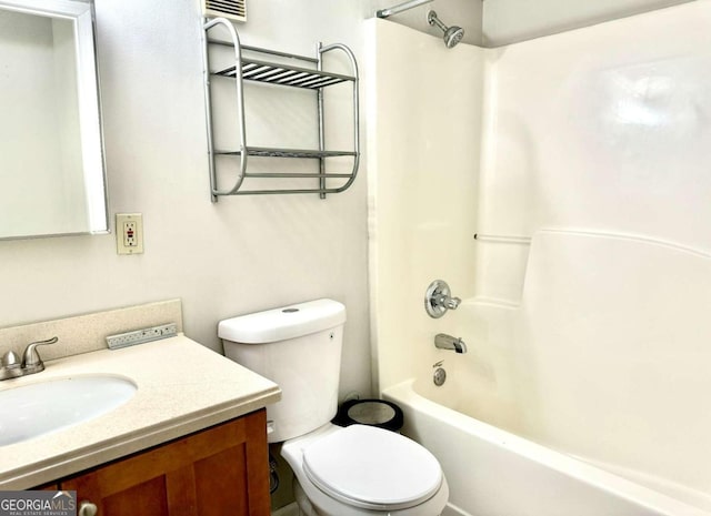 full bathroom featuring vanity, toilet, and shower / tub combination