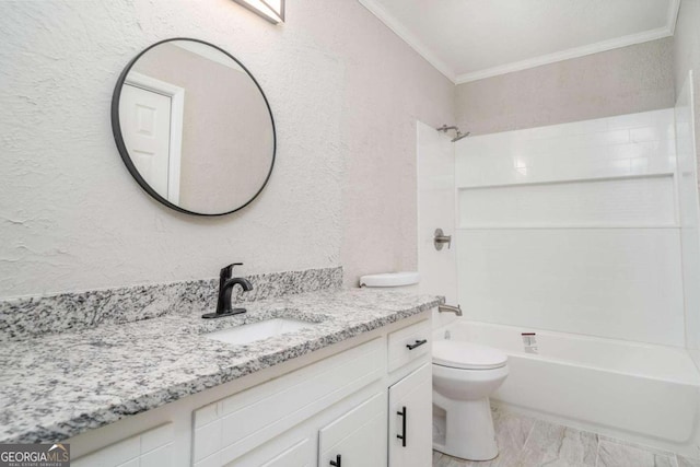 full bathroom with vanity, crown molding, washtub / shower combination, and toilet