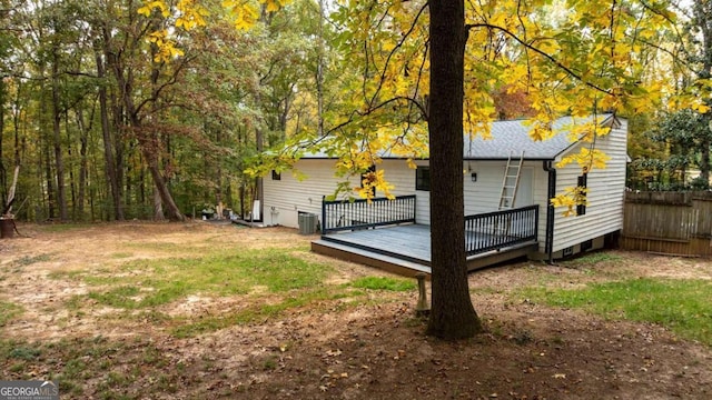 exterior space with central AC and a deck