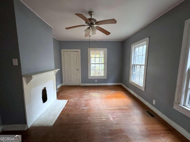 unfurnished living room with light hardwood / wood-style floors and ceiling fan