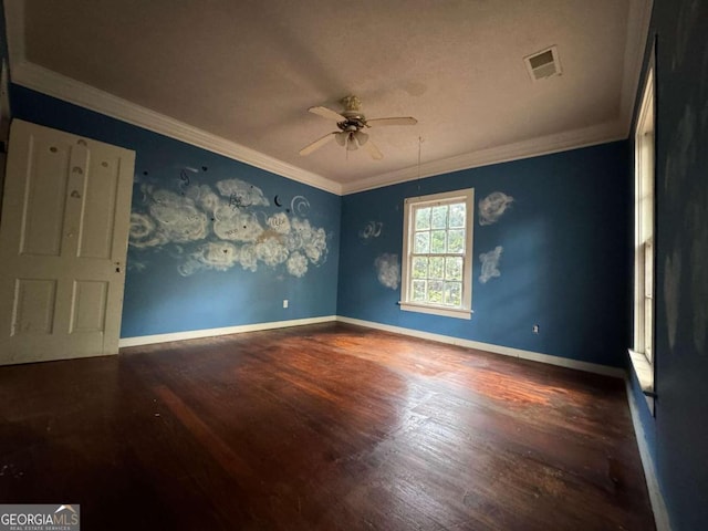 spare room featuring ceiling fan, hardwood / wood-style flooring, and ornamental molding