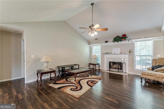 living room featuring ceiling fan, high vaulted ceiling, and dark hardwood / wood-style flooring