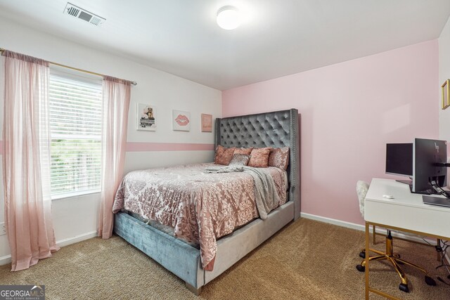 bedroom featuring carpet