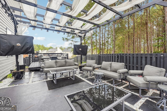 view of patio / terrace with an outdoor hangout area and a pergola