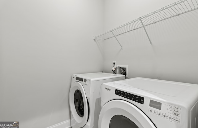 laundry area with washer and clothes dryer