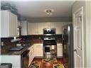 kitchen featuring dark countertops