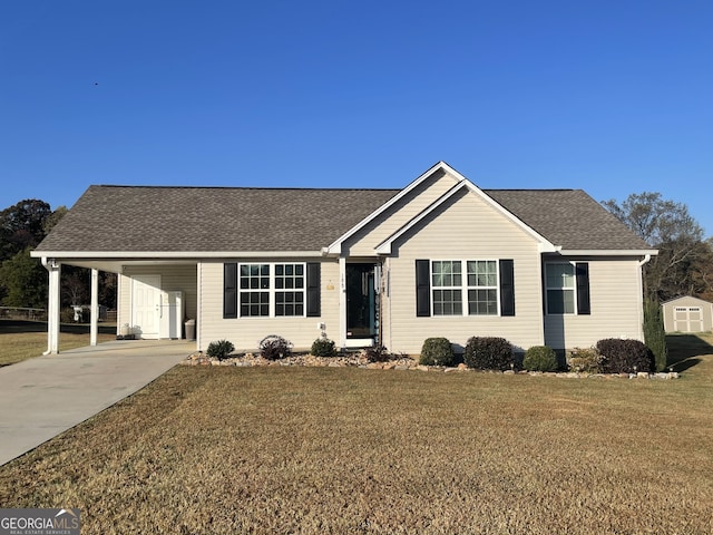 ranch-style house with a front yard, a storage unit, and a carport