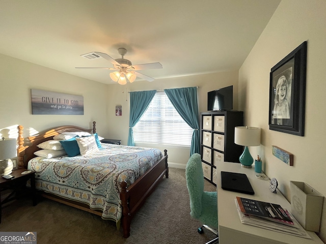 bedroom featuring ceiling fan and dark colored carpet